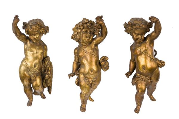 Lot of 3 putti in gilded bronze