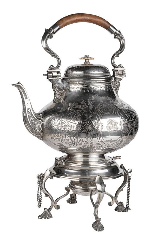 Silver metal tea kettle