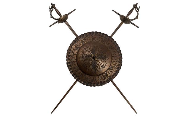 Shield with pair of trophy swords