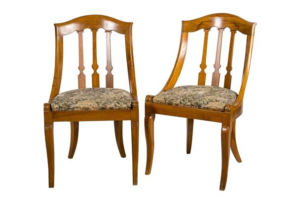 Pair of gondola-shaped chairs