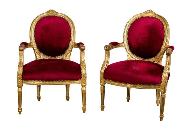 Pair of gilded wood armchairs