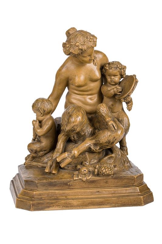 Claude Michel Clodion - - Sitting fauna with two small satyrs on either side