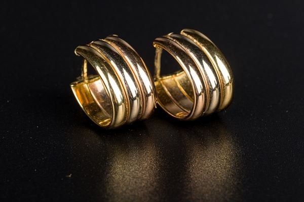 Pair of three-color gold earrings