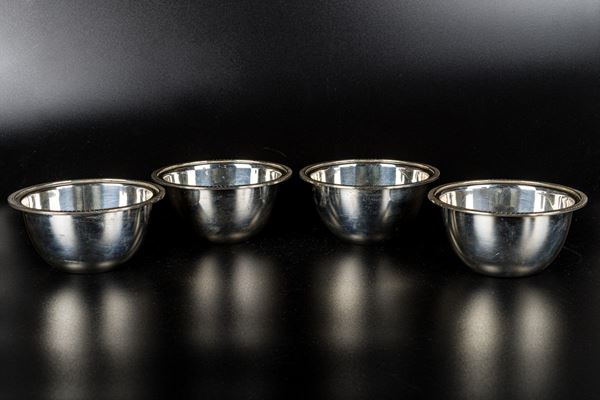 Lot of four 800 silver cups