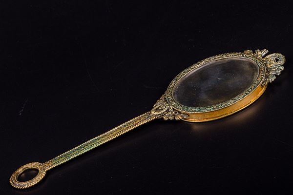 Hand mirror with miniature
