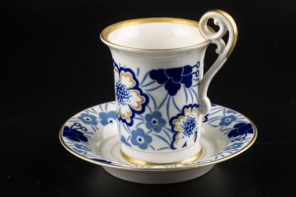 Collectible porcelain cup with saucer