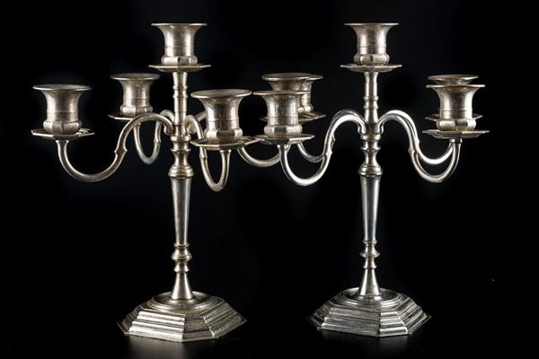 Pair of silver-plated metal candlesticks