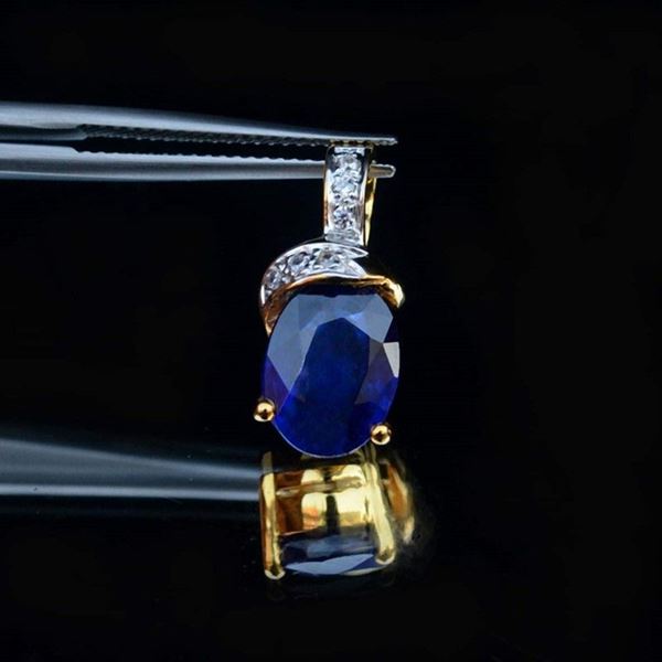 Gold plated 925 silver pendant with sapphire and zircons