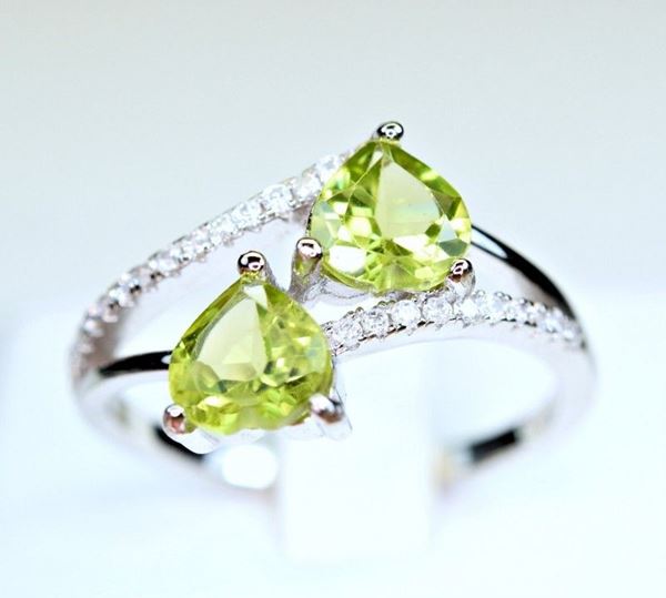 925 silver ring with two natural peridots and zircons