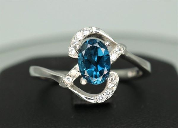 925 silver ring with blue topaz and zircons