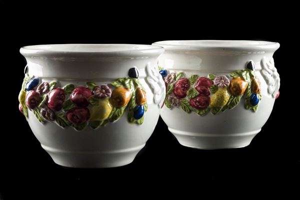 Pair of vase holders