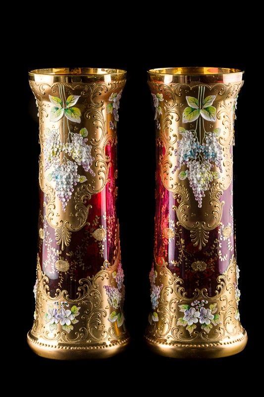 Pair of glass vase holders and golden decorations