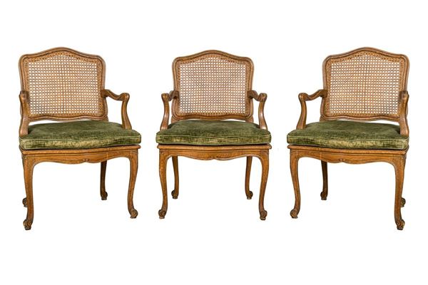 Three armchairs in walnut