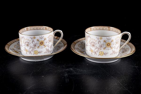 10 teacups with saucers