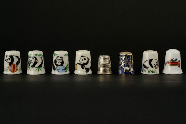 Lot of eight collectible thimbles in porcelain and metal