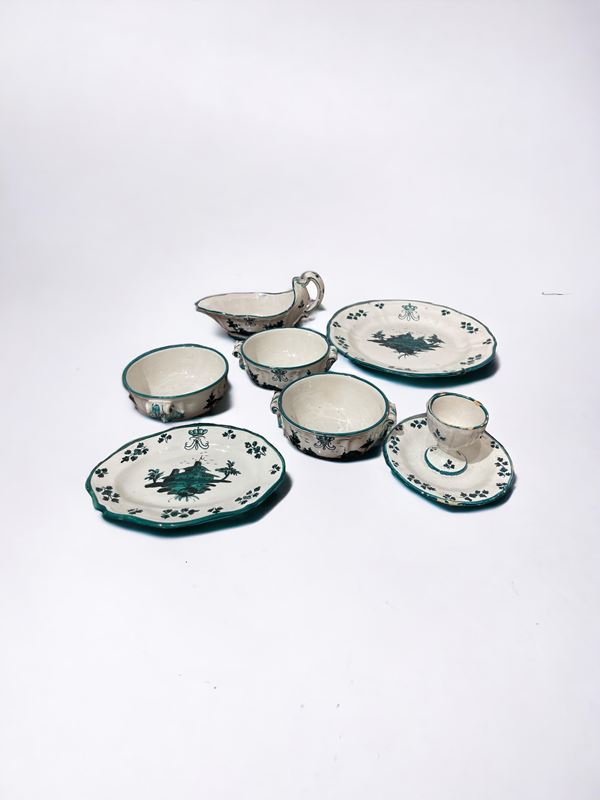 Lotto di sei oggetti in porcellana, con decori floreali verdi, stampigliatura alla base 'Imola'