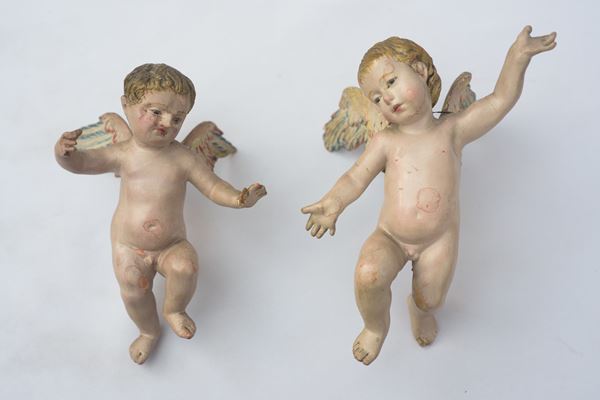 Coppia di putti alati da presepe