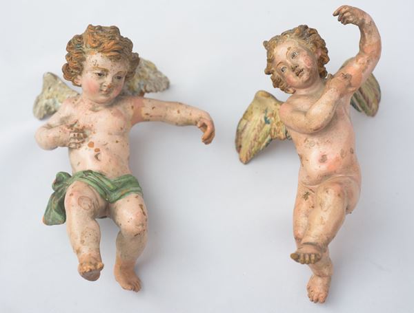 Coppia di putti alati da presepe