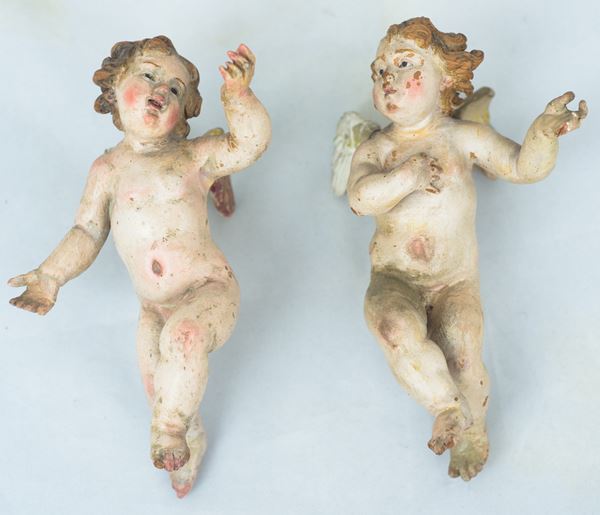 Coppia di putti alati da presepe  (Manifattura napoletana, XVIII secolo)  - Auction Important Roman collections - Silver, oriental art, furniture, sculptures, old masters and 19th century paintings - DAMS Casa d'Aste