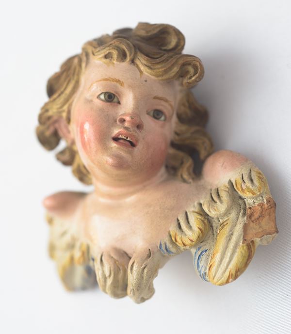 Putto alato da presepe  (Manifattura napoletana, XIX secolo)  - Asta Importanti collezioni romane - Argenti, arte orientale, arredi, sculture, dipinti antichi e del XIX secolo - DAMS Casa d'Aste