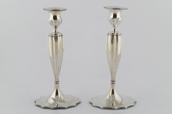 Pair of candlesticks in sterling silver