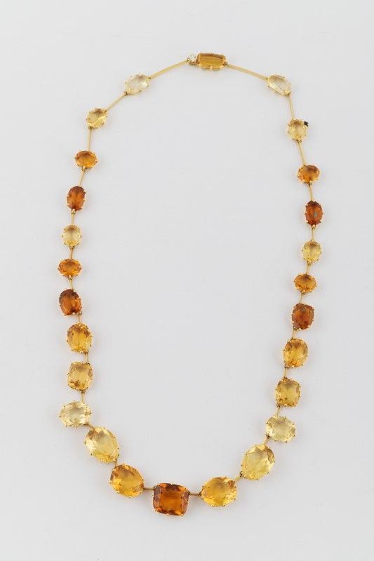 Yellow gold necklace with quartz and a diamond