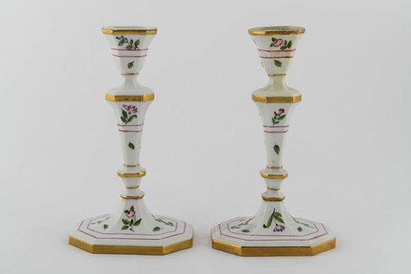Pair of candlesticks in white porcelain