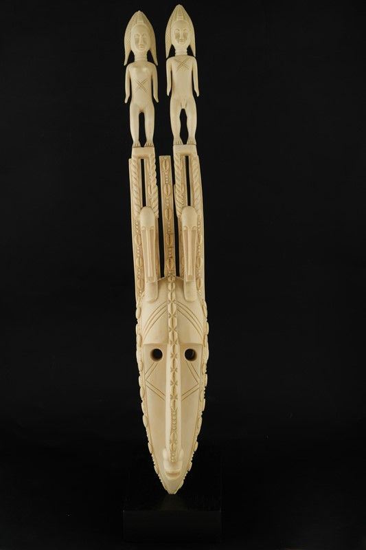 Ivory sculpture of an African tribal mask