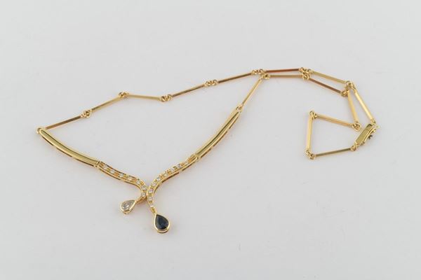 Yellow gold necklace with diamonds and sapphires